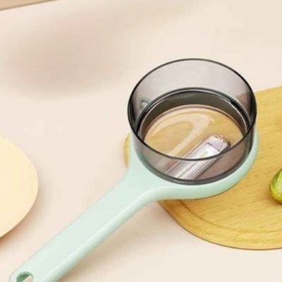 éplucheur à pommes variante vert
