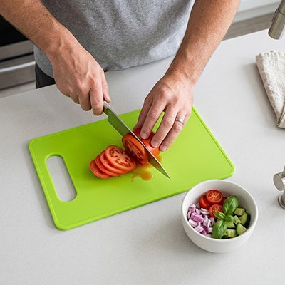 Planche a decouper coupe tomate