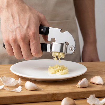 Presse ail ergonomique